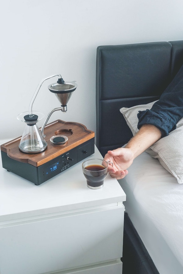 This alarm clock will wake you with a cup of freshly brewed coffee