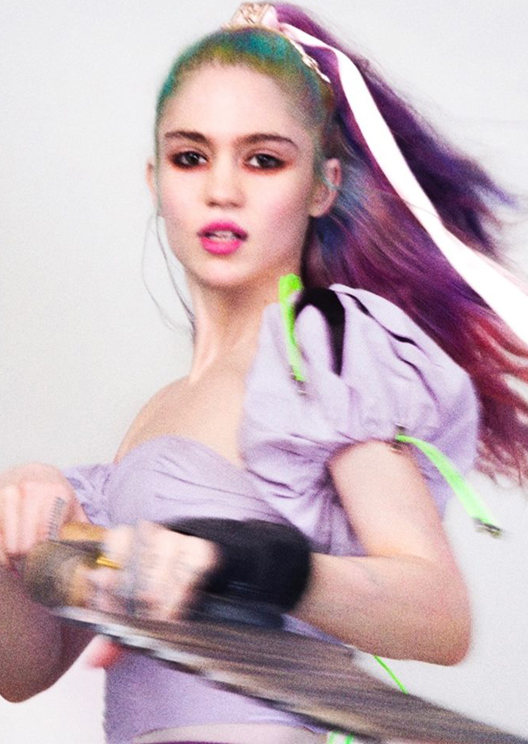 Your girl Grimes is back with all-new music and merch