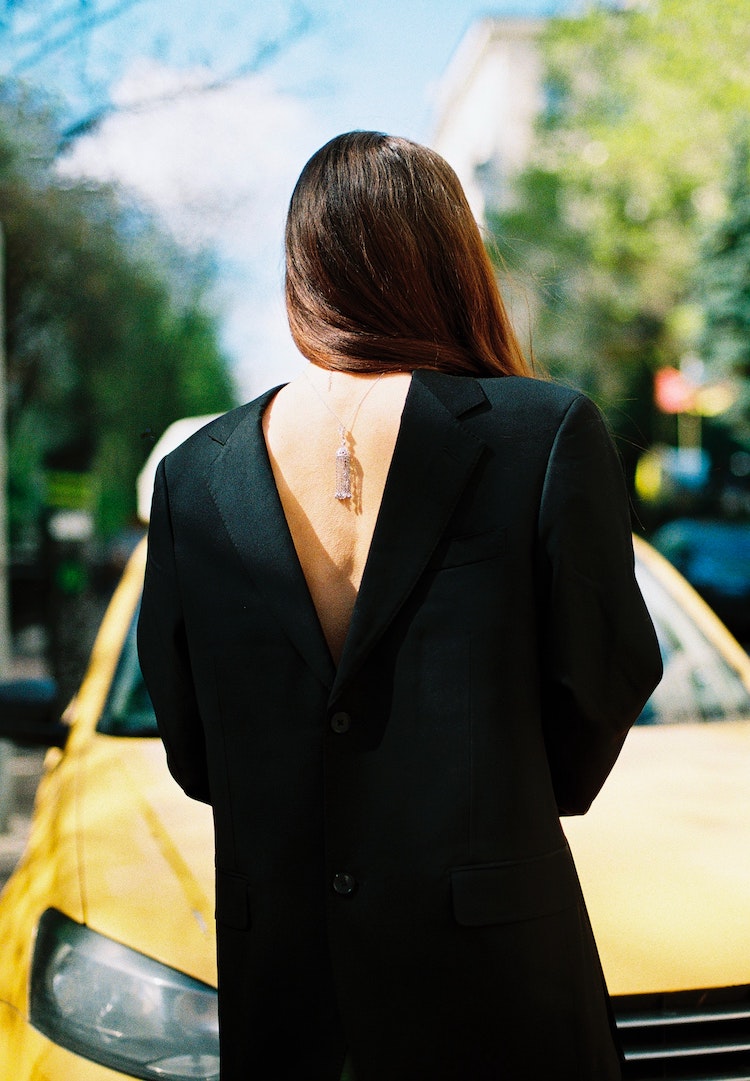 A dermal therapist on what causes back acne and how to treat it