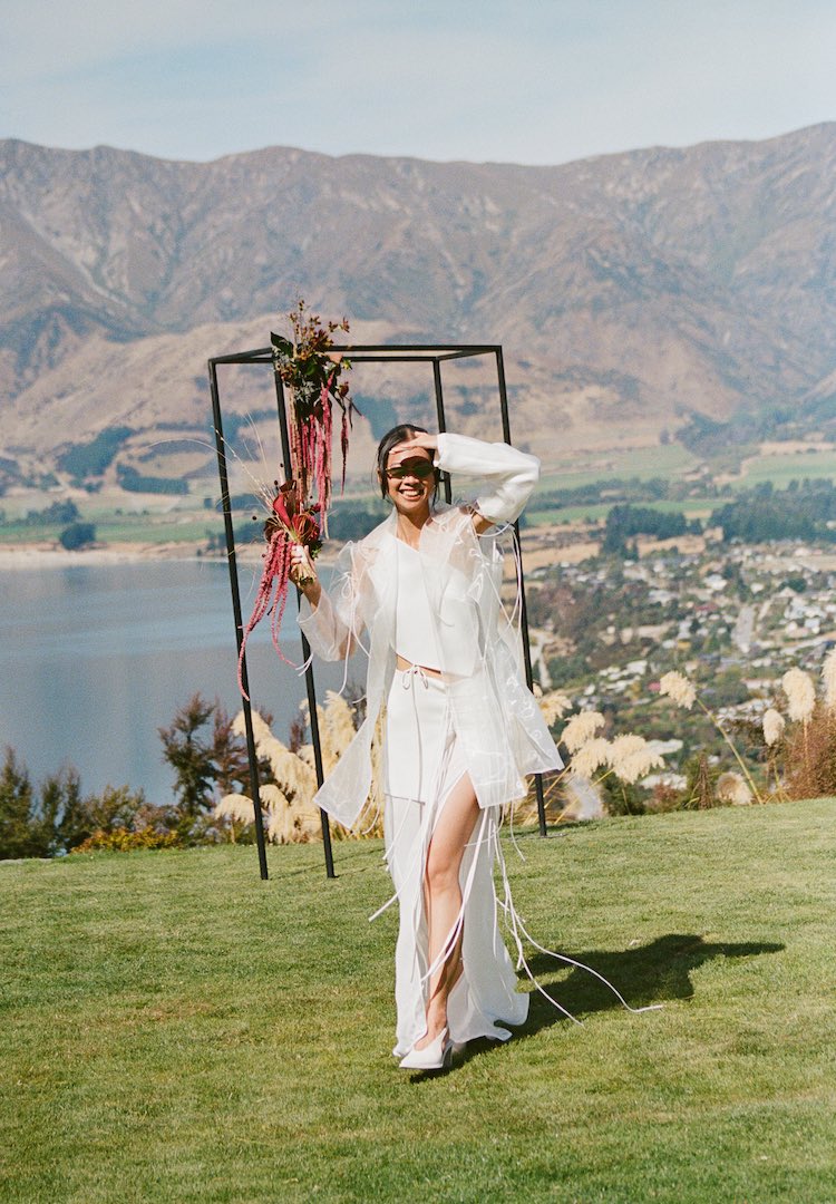 A four-piece bridal look and live jazz: Inside Shu and Matt’s Lake Hāwea wedding